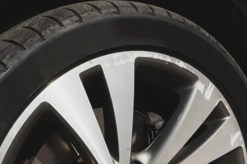 curb rash on alloy wheel